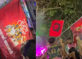 ക്ഷേത്രോത്സവത്തിനിടെ സൂരജ് വധക്കേസ് പ്രതികളുടെ ഫോട്ടോ പതിച്ച  കൊടികളുമായി സിപിഐഎം പ്രവർത്തകരുടെ ആഘോഷം