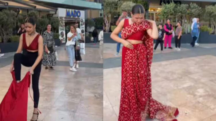 തുര്ക്കിയിലെ തിരക്കേറിയെ റോഡിൽ വച്ച് സാരിയുടുത്ത് റഷ്യൻ യുവതി; പിന്നാലെ എത്തി സുരക്ഷാ ജീവനക്കാരൻ, വിവാദം
