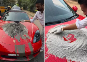 കോട്ടും കണ്ണടയും ഊരിവച്ച് പോർഷെയുടെ ബോണറ്റിൽവെച്ച് സിമന്റ് കുഴച്ചു, പിന്നാലെ റോഡിലെ കുഴിയടച്ചു, വൈറലായി യുവാവിന്റെ വീഡിയോ, വെറും ഷോയെന്ന് സോഷ്യല്‍ മീഡിയ