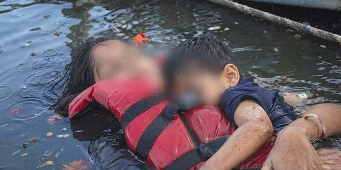 ലൈഫ് ജാക്കറ്റും ധരിച്ച് പൊന്നോമനയെ മാറോടണച്ചുള്ള അമ്മയുടെ മൃതദേഹ ചിത്രം: വ്യാജമെന്ന് കളക്ടർ; ചിത്രത്തിന് ബർഗി ഡാം അപകടവുമായി യാതൊരു ബന്ധവുമില്ല; ‘പ്രചരിപ്പിക്കുന്നവർക്കെതിരെ കർശന നടപടി സ്വീകരിക്കും‘