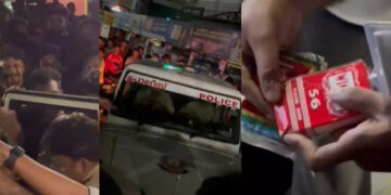 കൃത്യനിര്വഹണം തടസപ്പെടുത്തി, ഔദ്യോഗിക വാഹനത്തില് മദ്യക്കുപ്പിയും ചീട്ട് കെട്ടുകളും ഒളിപ്പിച്ച പൊലീസുകാരെ തടഞ്ഞുവച്ചു, 200 പേര്ക്കെതിരെ കേസ്