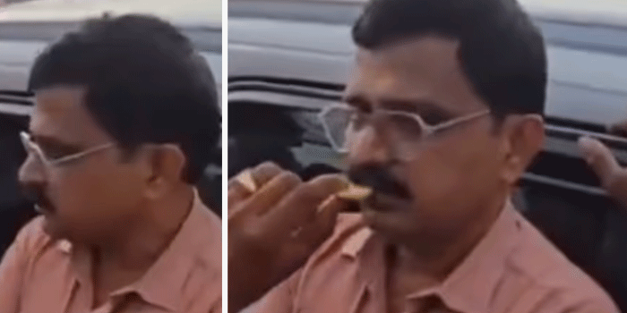 കടക്കാരനിൽനിന്ന് കൈക്കൂലി വാങ്ങിയെന്ന് ആരോപണം, ഭക്ഷ്യസുരക്ഷാ ഉദ്യോഗസ്ഥനെ വളഞ്ഞ് നാട്ടുകാർ; കാലാവധി കഴിഞ്ഞ ബിസ്ക്കറ്റ് വായിലേക്ക് തിരുകാൻ ശ്രമം; വീഡിയോ